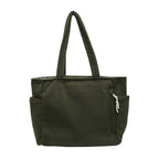 Tilda – Bolsa de hombro acanalada con detalle de cordón en color Verde